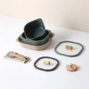 Green ceramic cookware set from Ousiahome’s FIKA collection with stackable space-saving design