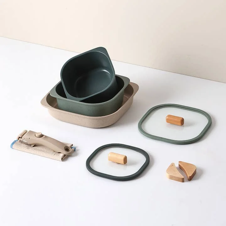 Green ceramic cookware set from Ousiahome’s FIKA collection with stackable space-saving design