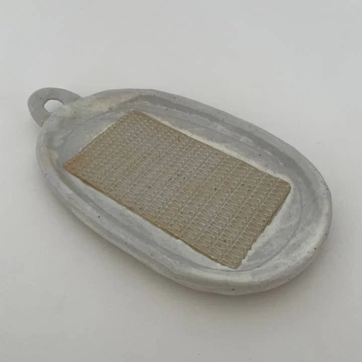 Neutral handmade Japanese ceramic grater with handle and spout