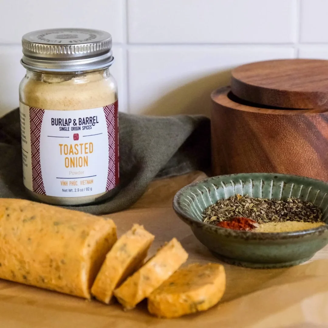 Jar of Burlap & Barrel Toasted Onion Powder with warm, sweet allium notes