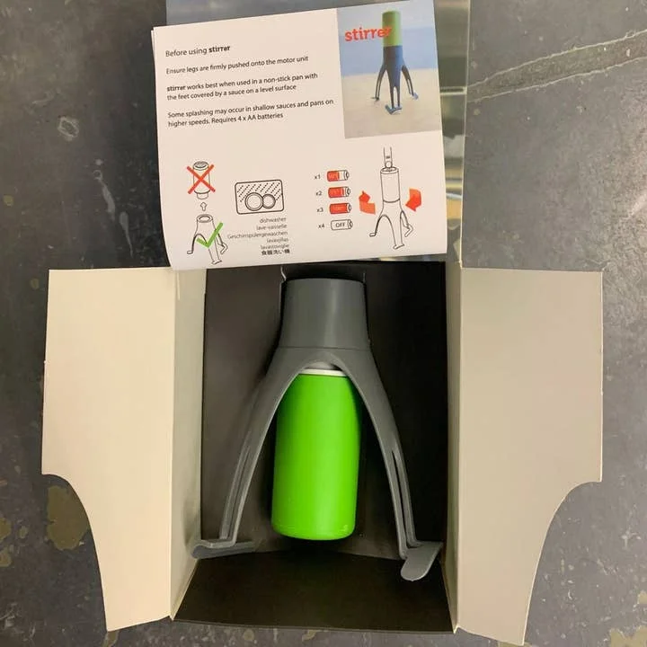 The VIGOR Automatic Pan Stirrer is a cordless, battery-powered cooking accessory with nylon legs and 3-speed rotation—ideal for hands-free stirring of sauces, soups, and more.